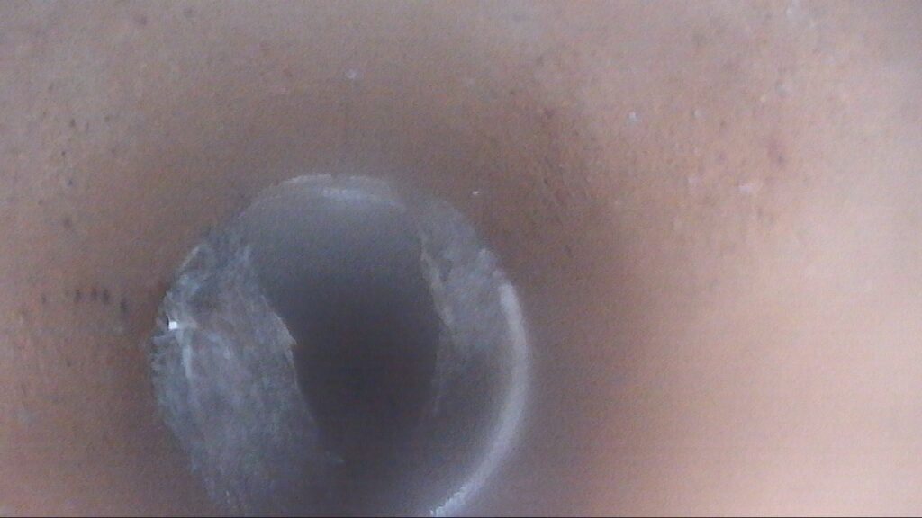 drain-backing-up-burlington-ia - Drain Cleaning Experts in Burlington, IA drain backing up inside sewer pipe during camera inspection in Burlington Iowa